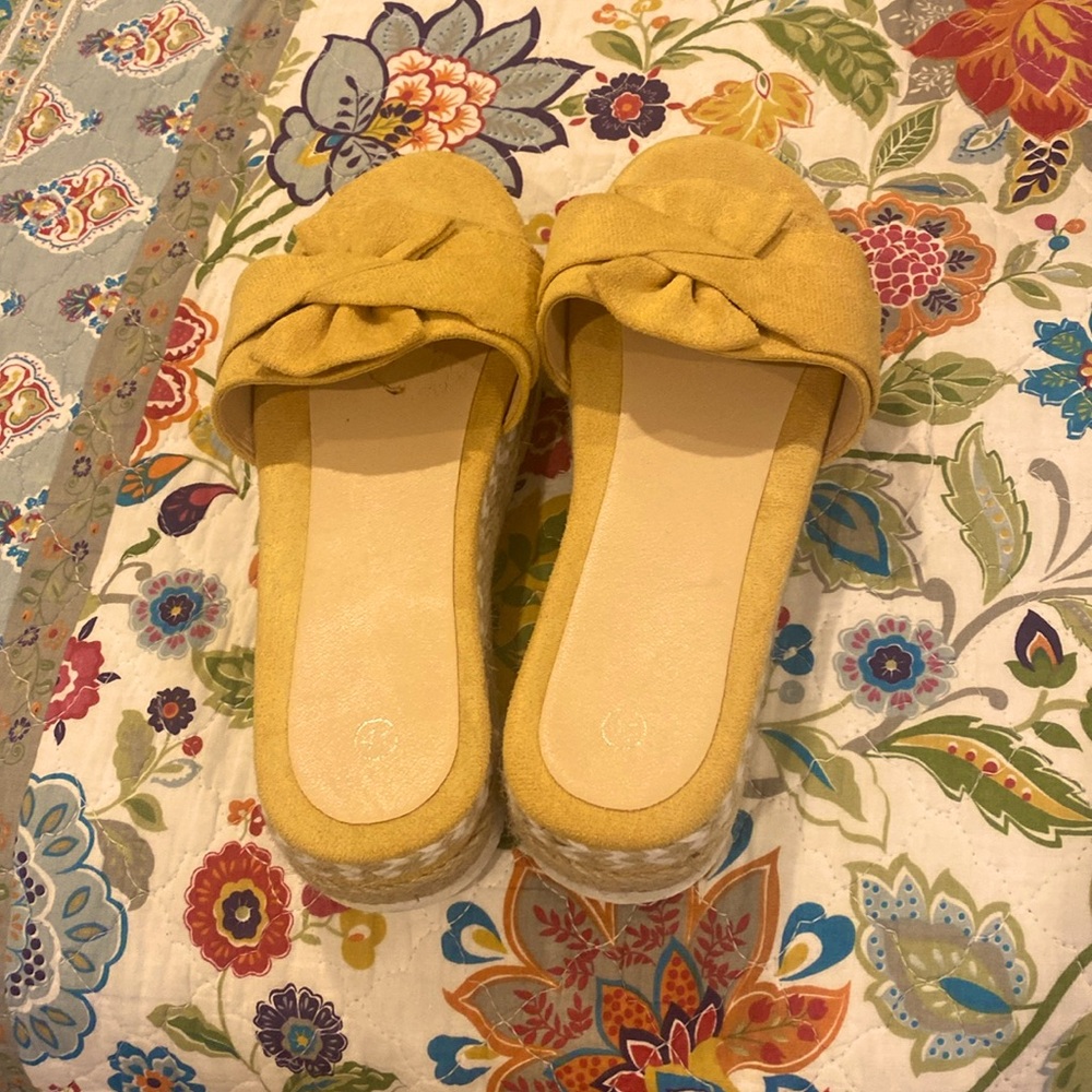 Yellow slides.  Bow front.  Worn once.  Size 9